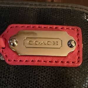 Coach Black Clutch with Red Trim and Gold Plaque